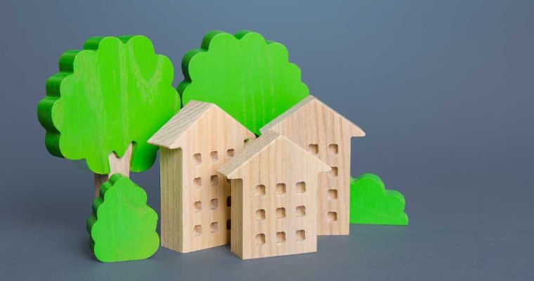 Residential buildings among trees