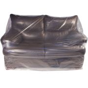 A dark leather sofa wrapped in a custom furniture cover